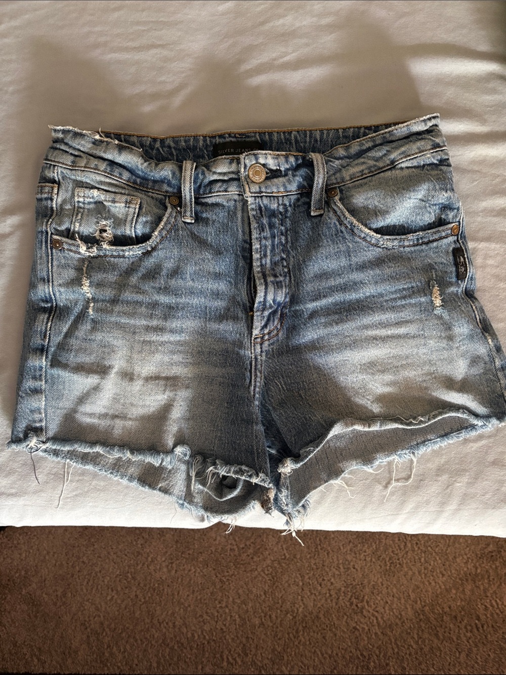 Silver Jeans Light Blue Distressed Denim Cutoff Shorts